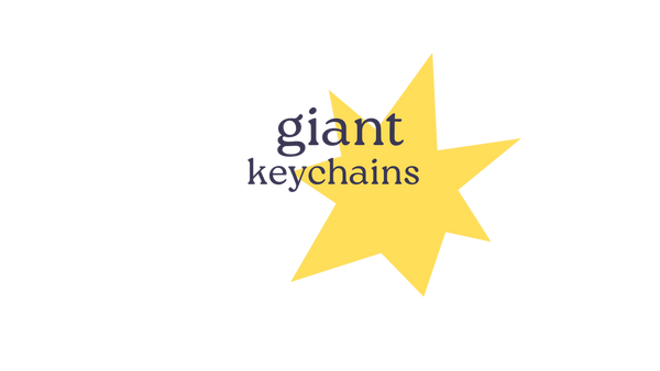Logo for 'giant keychains' with a yellow star on a white background